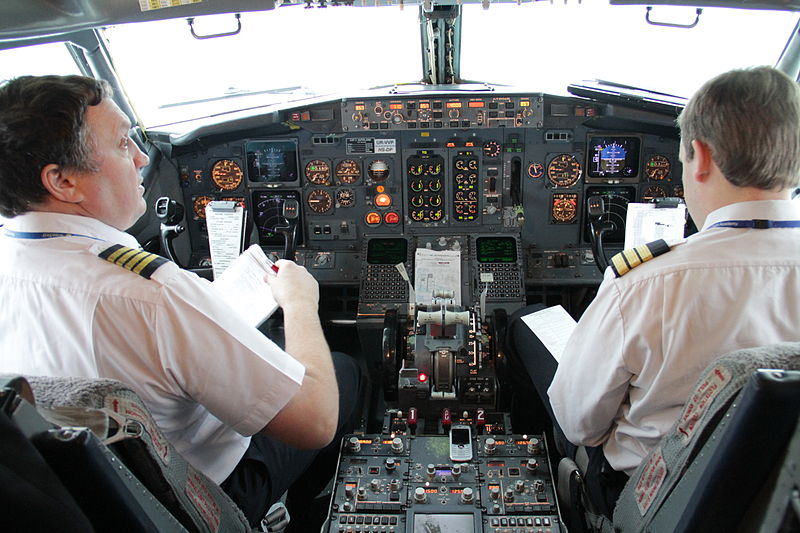 Commercial pilots before take-off. Photo licensed via Creative Commons.